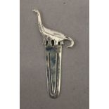 A 925 silver bookmark formed as a dinosaur. 5.5 cm high.