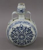 A Chinese blue and white porcelain moon vase. 30 cm high.