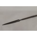 A tribal spear. 183 cm long.