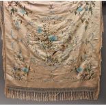 A Chinese embroidered silk shawl decorated with birds and insects. 110 cm wide.