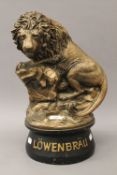 A large Lowenbrau Lion advertising model. 43.5 cm high.