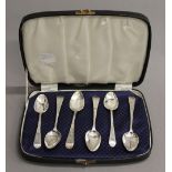 A cased set of Georgian silver bright cut teaspoons. 2.3 troy ounces.