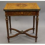 A 19th century style Continental inlaid card table. 70 cm wide.