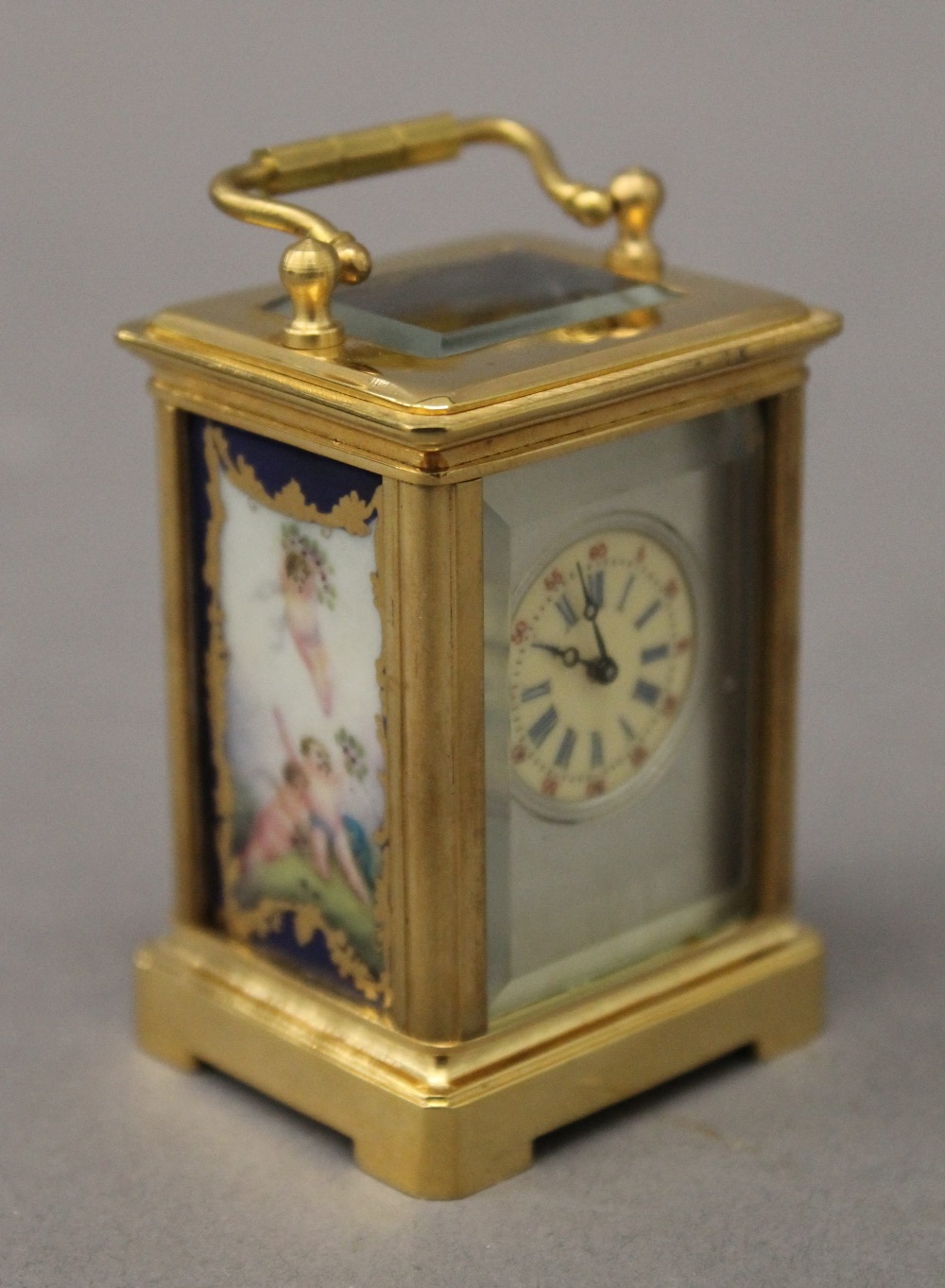 A miniature carriage clock with porcelain panels. 7.5 cm high. - Image 3 of 9