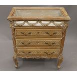 A French vitrine chest. 68.5 cm wide.