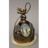 A 19th century French counter top bell set with Parisian views. 13 cm high.