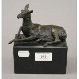 A bronze model of a donkey on a plinth base. 15 cm high.