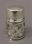 A sterling silver overlay glass jar. 6 cm high.