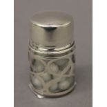 A sterling silver overlay glass jar. 6 cm high.