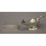 A 925 silver table lighter formed as an oil lamp and a miniature silver snuff box in the form of a