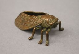 A bronze model of a fly. 4.5 cm long.