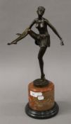 An Art Deco style bronze model of a dancing girl. 48 cm high.