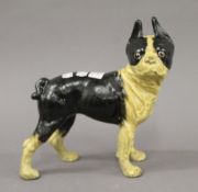 An iron model of a pug dog. 24 cm high.