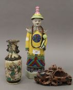 A 19th century Chinese crackle glaze vase, together with a soapstone carving and a porcelain figure.