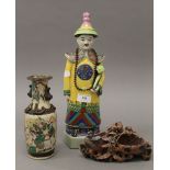 A 19th century Chinese crackle glaze vase, together with a soapstone carving and a porcelain figure.