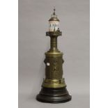 A late 19th century French lighthouse clock. 64 cm high.