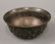A Chinese bronze bowl. 16 cm diameter.