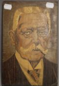 A marquetry inlaid panel depicting Otto Von Bismarck. 18 x 27 cm.