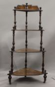 A Victorian inlaid walnut whatnot, an Edwardian sewing box and four chairs. The former 133 cm high.