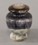 A fluorite vase. 13 cm high.