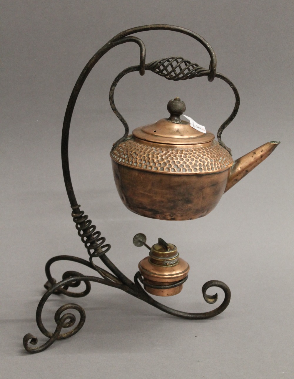 An Arts & Crafts wrought iron and copper kettle on stand. 38 cm high. - Image 2 of 4