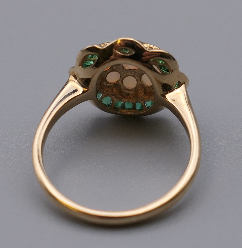 A 9 ct gold, opal and emerald ring. Ring size L/M. 2.6 grammes total weight. - Image 4 of 4