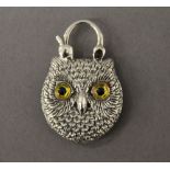 A silver padlock formed as an owl. 2.5 cm wide.