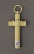 An ivorine angel headed communion cross. 17.5 cm high.