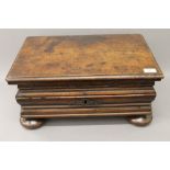 A 17th/18th century Continental walnut box. 50 cm wide.