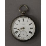 A silver pocket watch. 4.5 cm diameter.