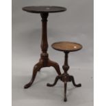 Two mahogany tripod tables. The largest 67 cm high.