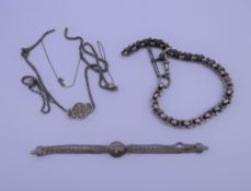 A silver Albert chain, etc.