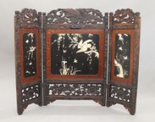 A 19th century Japanese bone, ivory and mother-of-pearl set folding screen.