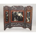 A 19th century Japanese bone, ivory and mother-of-pearl set folding screen.