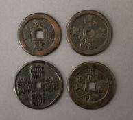 Four Chinese coins