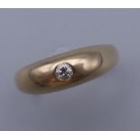 A 9 ct gold gentleman's diamond set ring. Ring Size U. 6 grammes total weight.