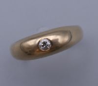 A 9 ct gold gentleman's diamond set ring. Ring Size U. 6 grammes total weight.