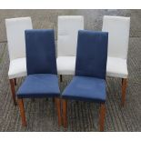 Five modern upholstered dining chairs. 96 cm high.