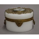 A 19th century French Palais Royale opaline glass and finely worked ormolu oval shaped box with
