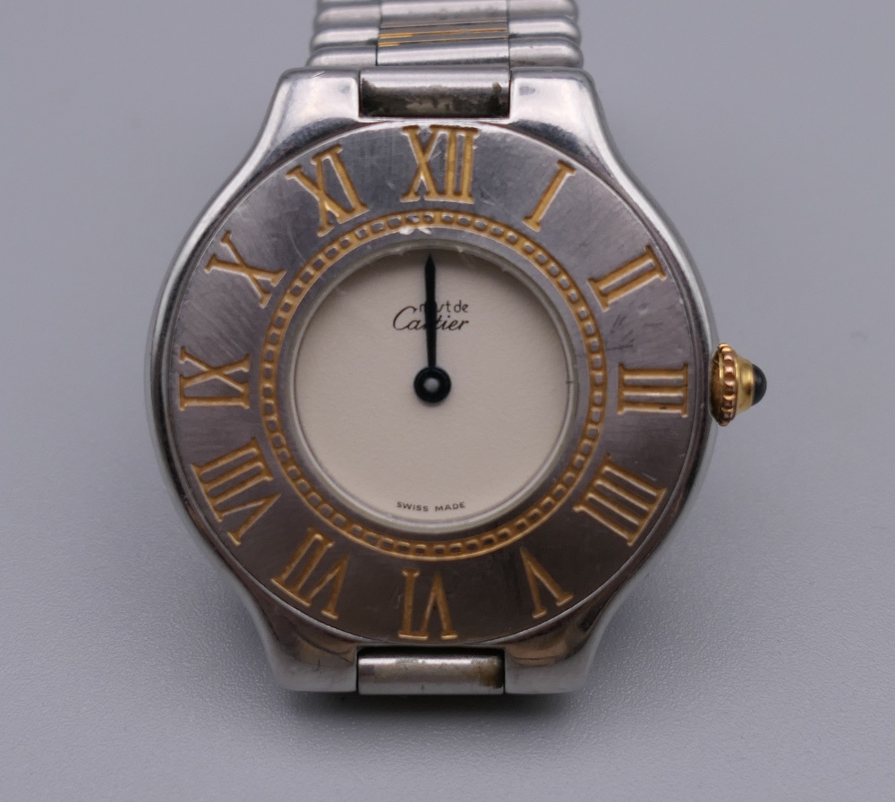 A Must De Cartier wristwatch. 3.75 cm wide.