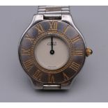 A Must De Cartier wristwatch. 3.75 cm wide.