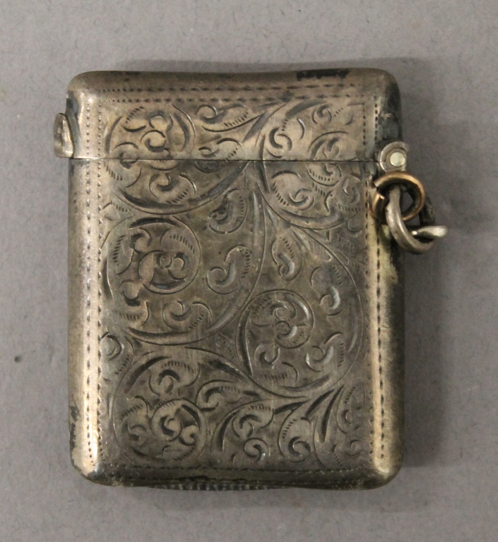 An engraved silver vesta. 4.75 cm high. - Image 2 of 5