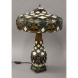A Tiffany style lamp, with light up base. 59 cm high.