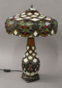 A Tiffany style lamp, with light up base. 59 cm high.