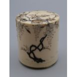 A 19th century shibayama ivory inlaid cylindrical box. 5.25 cm high.