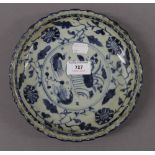 A Chinese blue and white porcelain dish. 20.5 cm diameter.