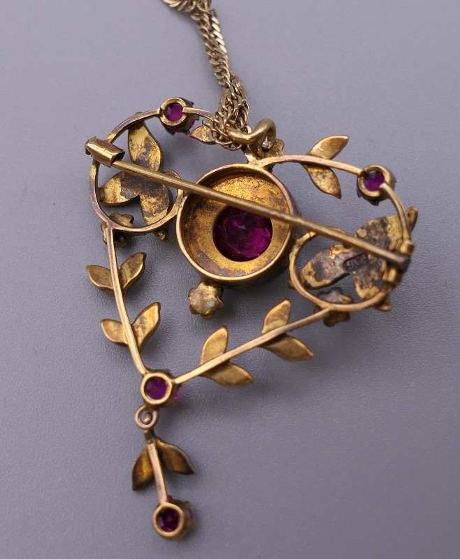 An Edwardian 9 ct gold seed pearl and red stone set pendant, on 9 ct gold chain. The pendant 4. - Image 2 of 5