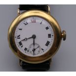 A Longines 9 ct gold wristwatch. 3 cm wide. 31.8 grammes total weight.