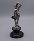 A silver model of a Bacchic. 13 cm high. 184.2 grammes total weight.