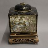 A large Meiji period Satsuma lidded vase of square form, with pierced lid,